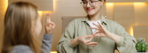 sign language interpreter with a student