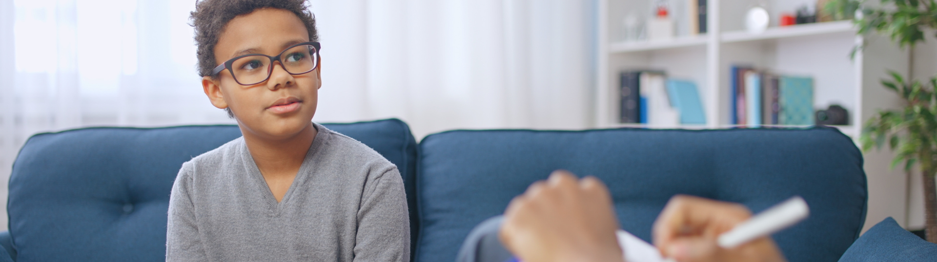 school psychologist with a student — What Does a School Psychologist Do?